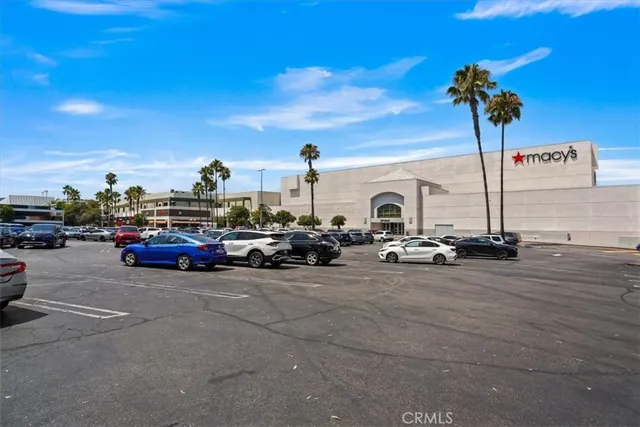 a view of a street with cars