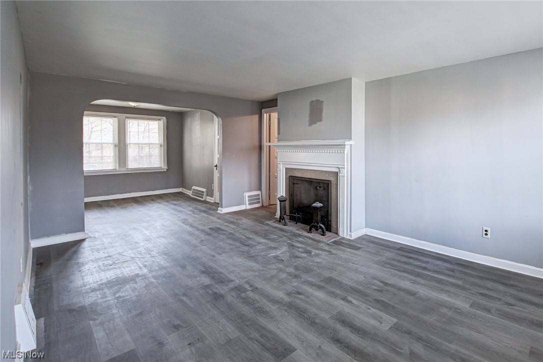 3423 Westbury Road Cleveland, OH 44120 - Photo 33 of 38 Unfurnished living room with dark hardwood / wood-style floors