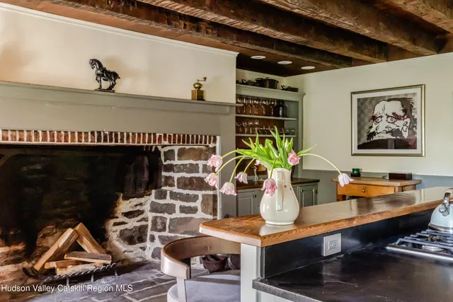 a view of a table and chairs in a room
