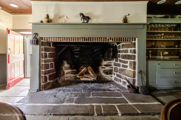 a bathroom with a sink a mirror and a shower