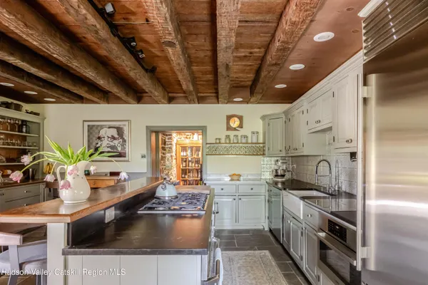 a bathroom with a tub and a sink