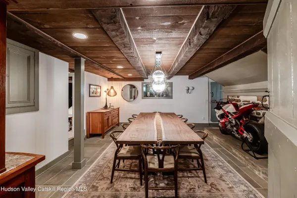 a bathroom with a bathtub and window