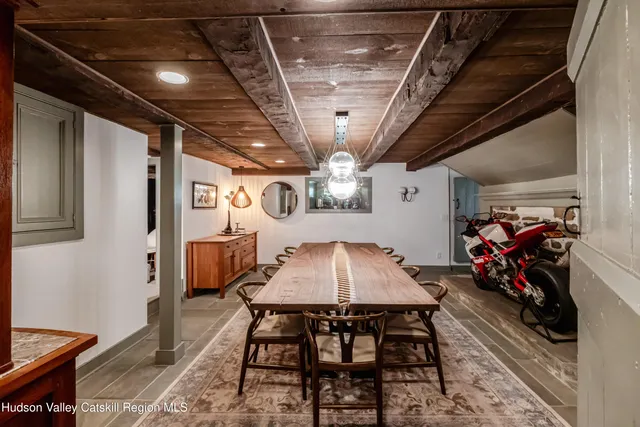 a bathroom with a bathtub and window