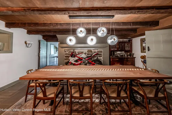 a bathroom with a shower sink vanity and mirror