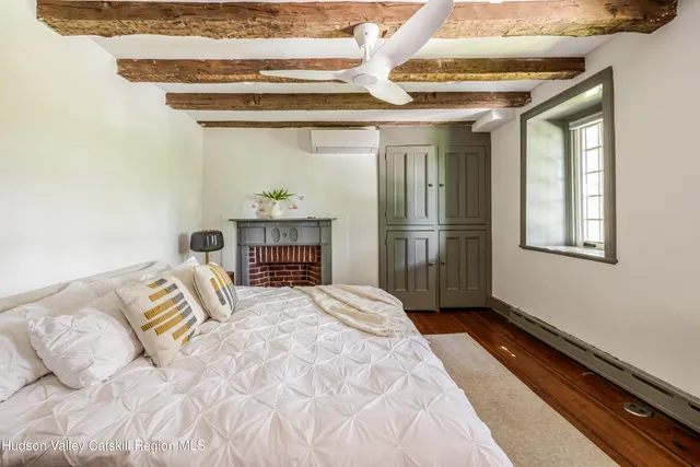 a view of a door and wooden floor