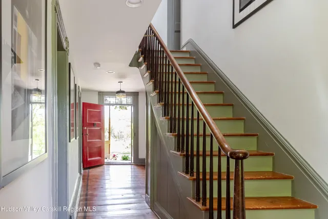 a view of a swimming pool with a yard