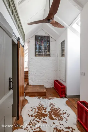 a view of a house with a yard and garage
