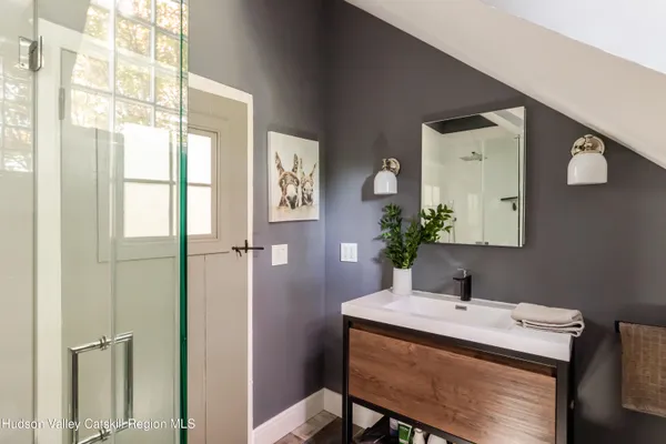 a view of a bench in front of house