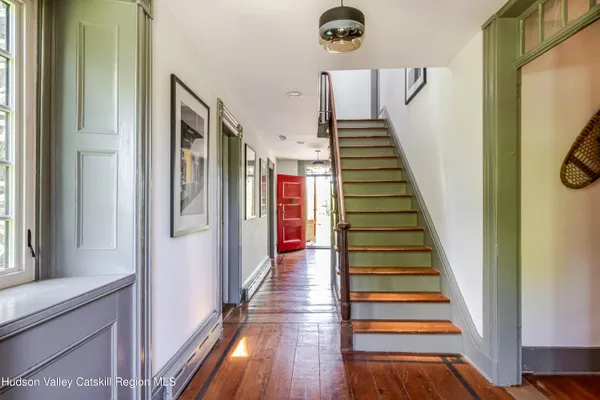 a potted plant sitting next to a window