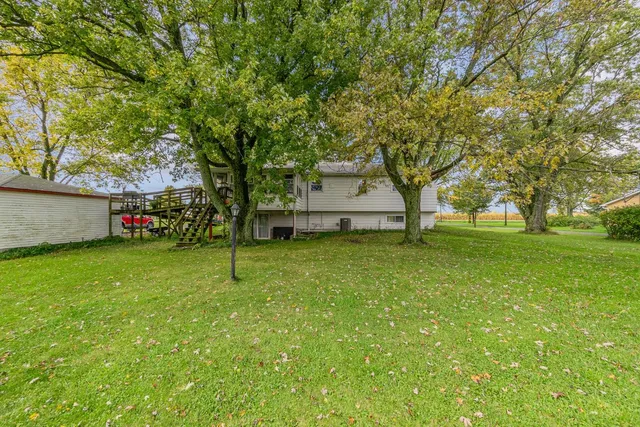 a house with trees in front of it