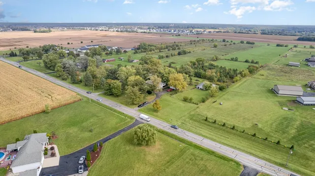 a view of a lake with a big yard