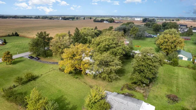 a view of a lake with a yard