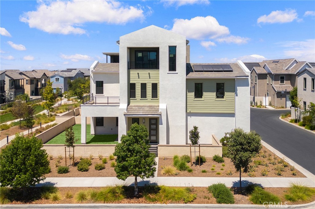 123 Bosal Irvine, CA 92618 - Photo 2 of 75 a front view of a house with a yard