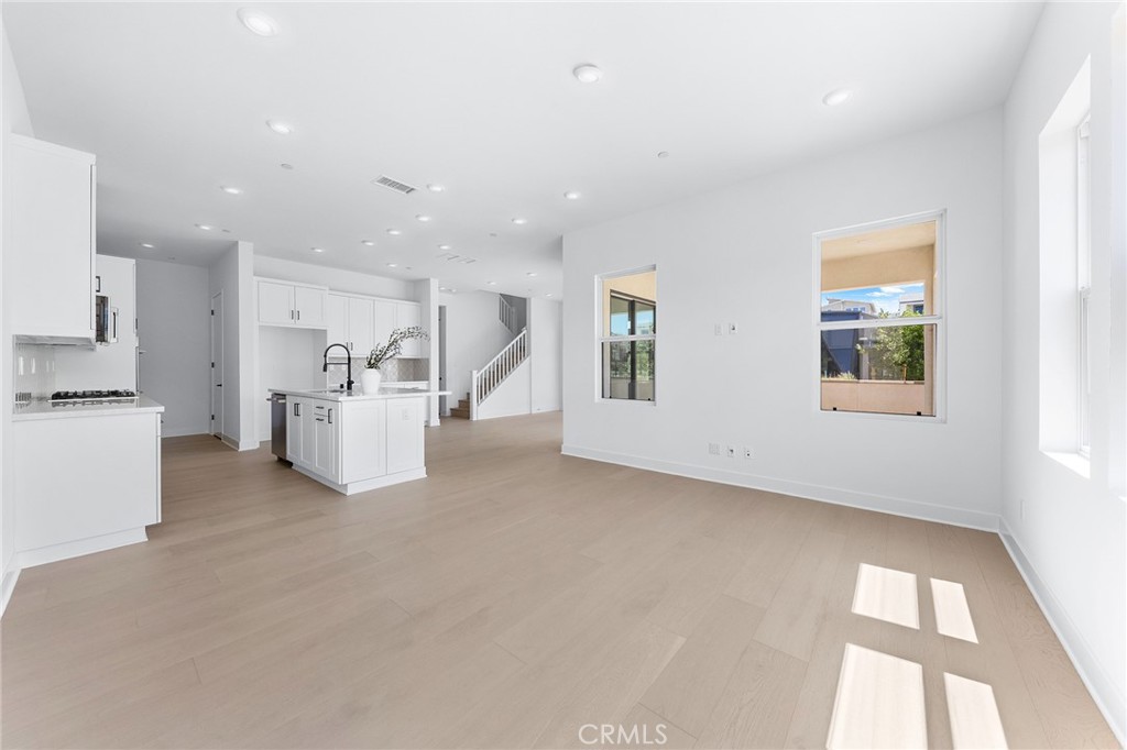 123 Bosal Irvine, CA 92618 - Photo 23 of 75 a view of a kitchen with furniture and refrigerator
