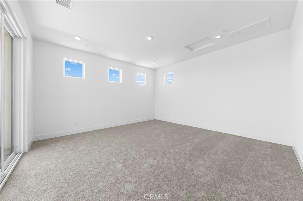 123 Bosal Irvine, CA 92618 - Photo 57 of 75 an empty room with a empty space and windows