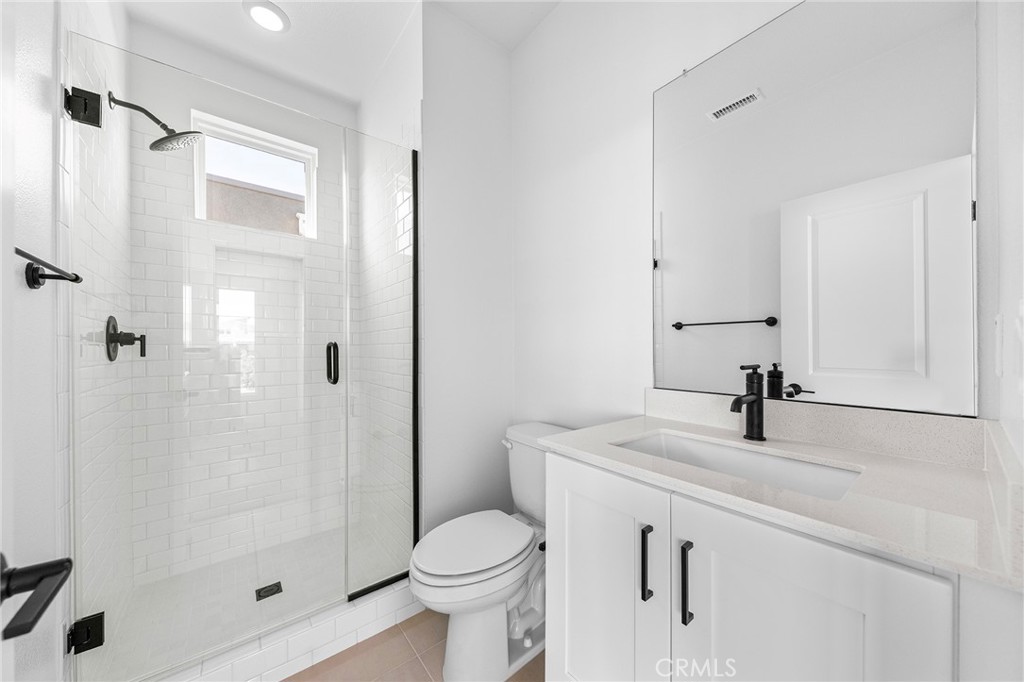 123 Bosal Irvine, CA 92618 - Photo 60 of 75 a bathroom with a sink toilet and shower