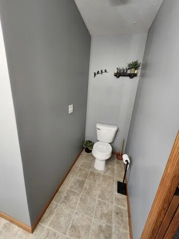 a bathroom with a toilet