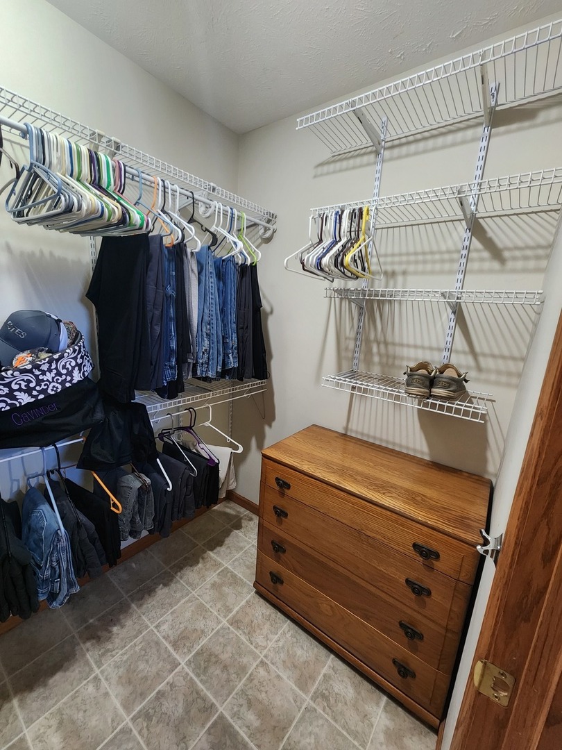 302 South Walnut Street Colfax, IL 61728 - Photo 15 of 25 a room with a bed and a table