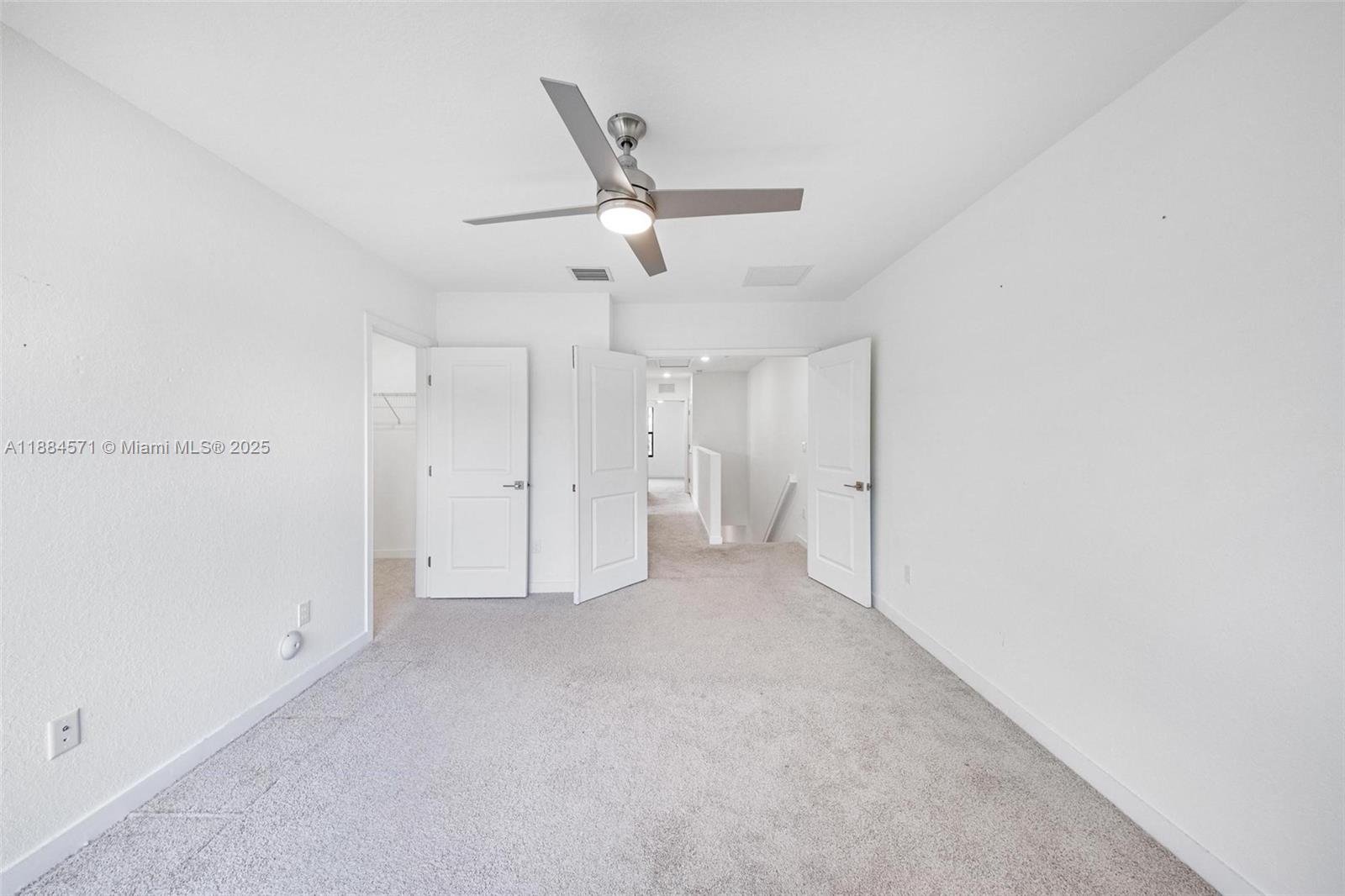 186 Southeast 5th Court, Unit 186 Deerfield Beach, FL 33441 - Photo 6 of 10 a view of an empty room
