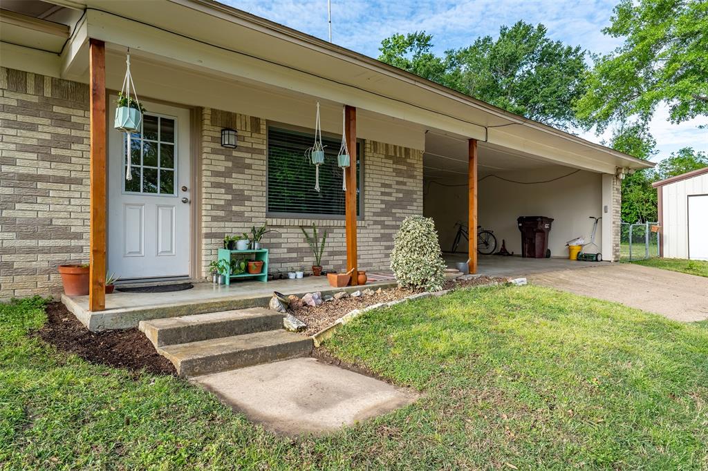 621 Athens Street Canton, TX 75103 - Photo 1 of 25 a view of a house with backyard and sitting area