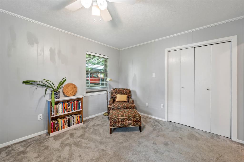 621 Athens Street Canton, TX 75103 - Photo 12 of 25 a room with bookshelf and a window