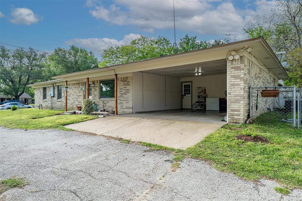 621 Athens Street Canton, TX 75103 - Photo 24 of 25 a view of a house with a backyard