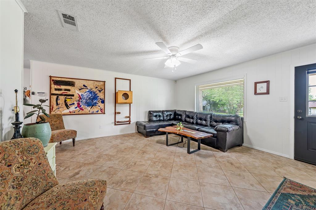 621 Athens Street Canton, TX 75103 - Photo 3 of 25 a living room with furniture and a window
