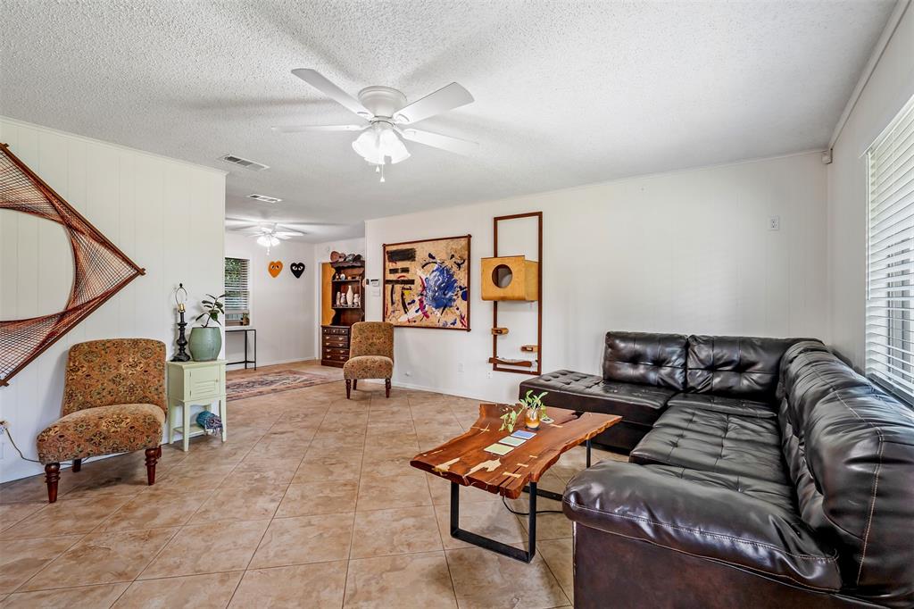 621 Athens Street Canton, TX 75103 - Photo 4 of 25 a living room with furniture and wooden floor