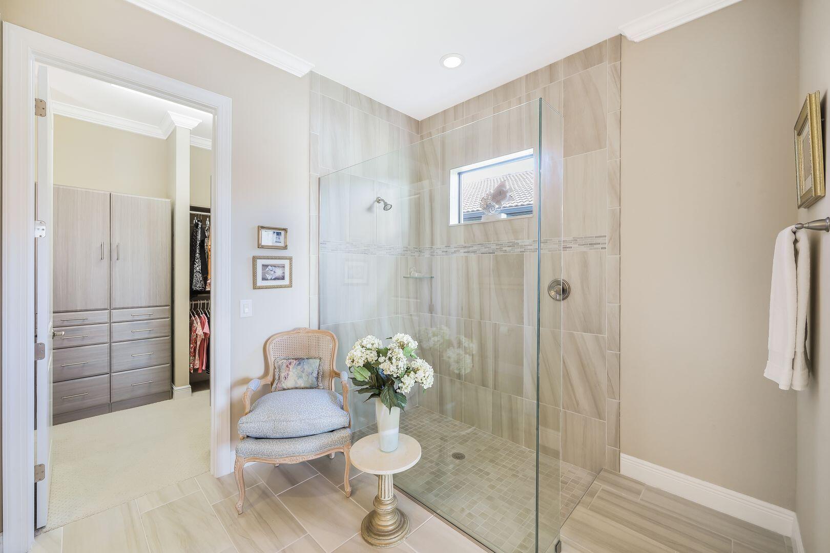 1433 Redona Way Naples, FL 34113 - Photo 17 of 50 a bathroom with a sink toilet and shower