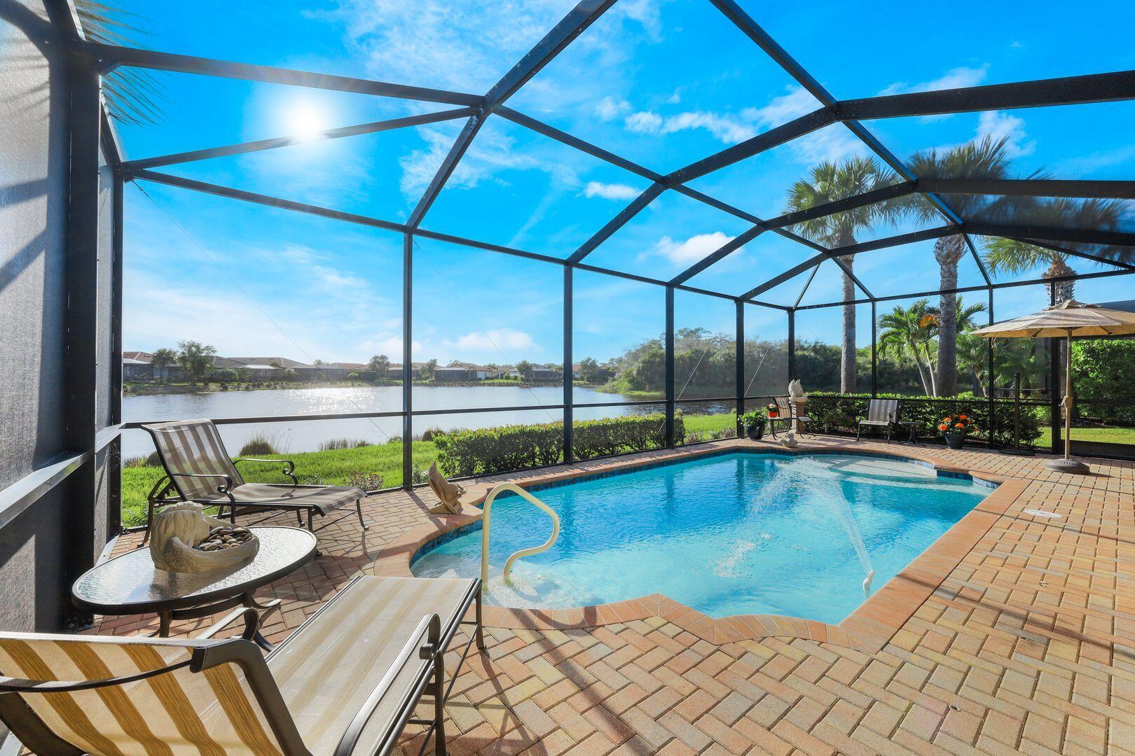 1433 Redona Way Naples, FL 34113 - Photo 31 of 50 a view of swimming pool with seating area and furniture