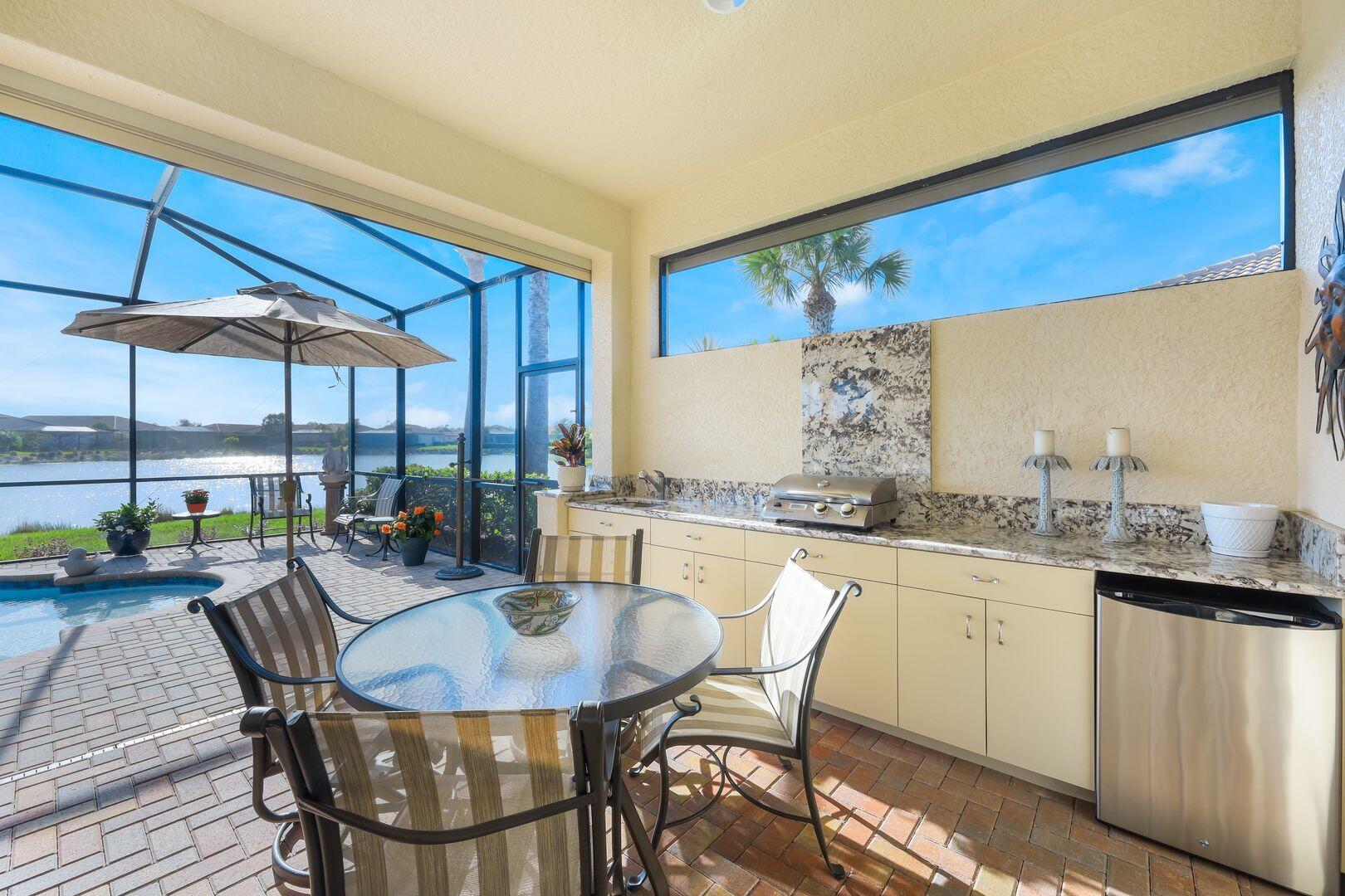 1433 Redona Way Naples, FL 34113 - Photo 33 of 50 a dining room with furniture and window