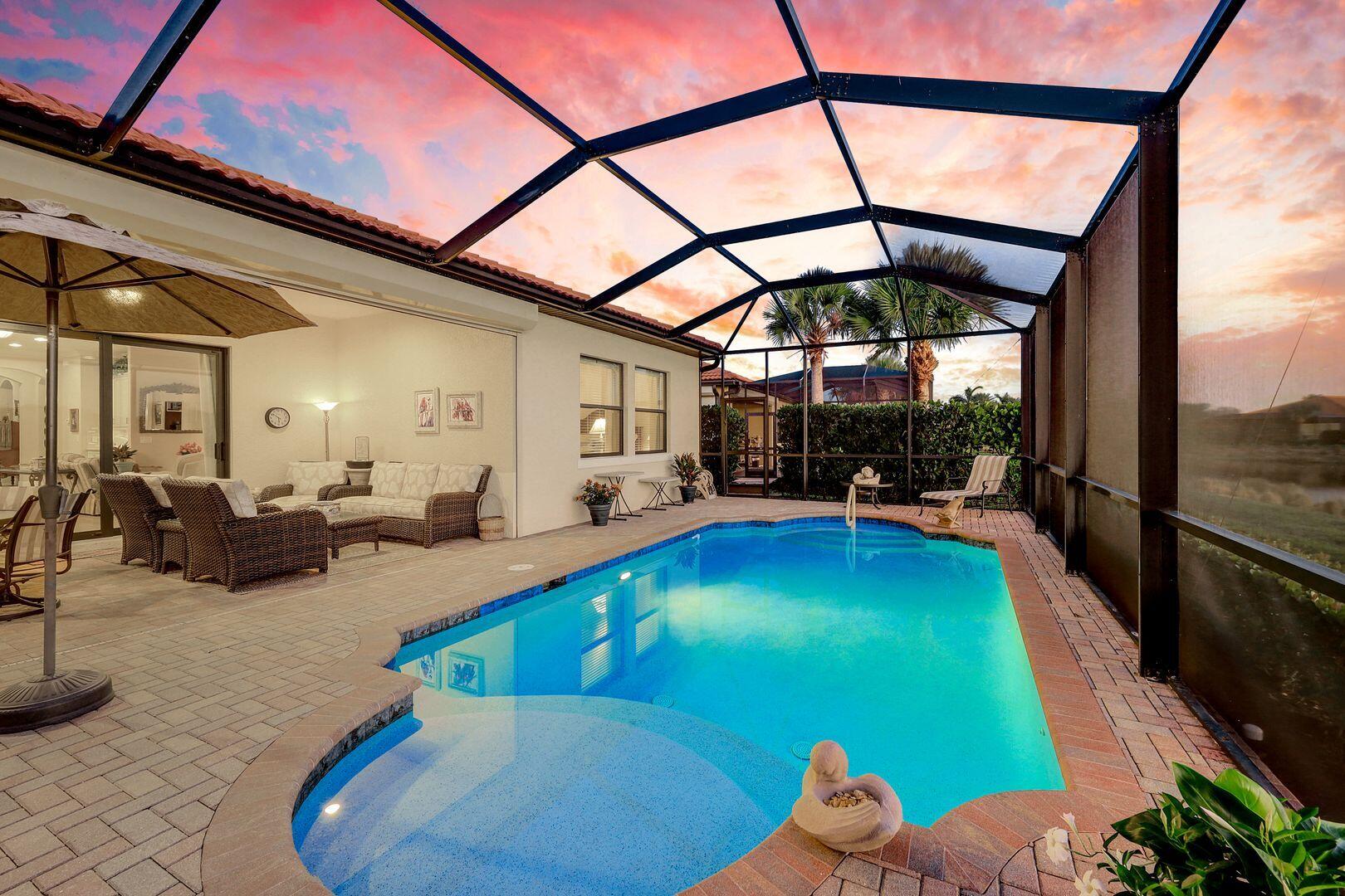 1433 Redona Way Naples, FL 34113 - Photo 36 of 50 a living room with furniture and a wooden floor