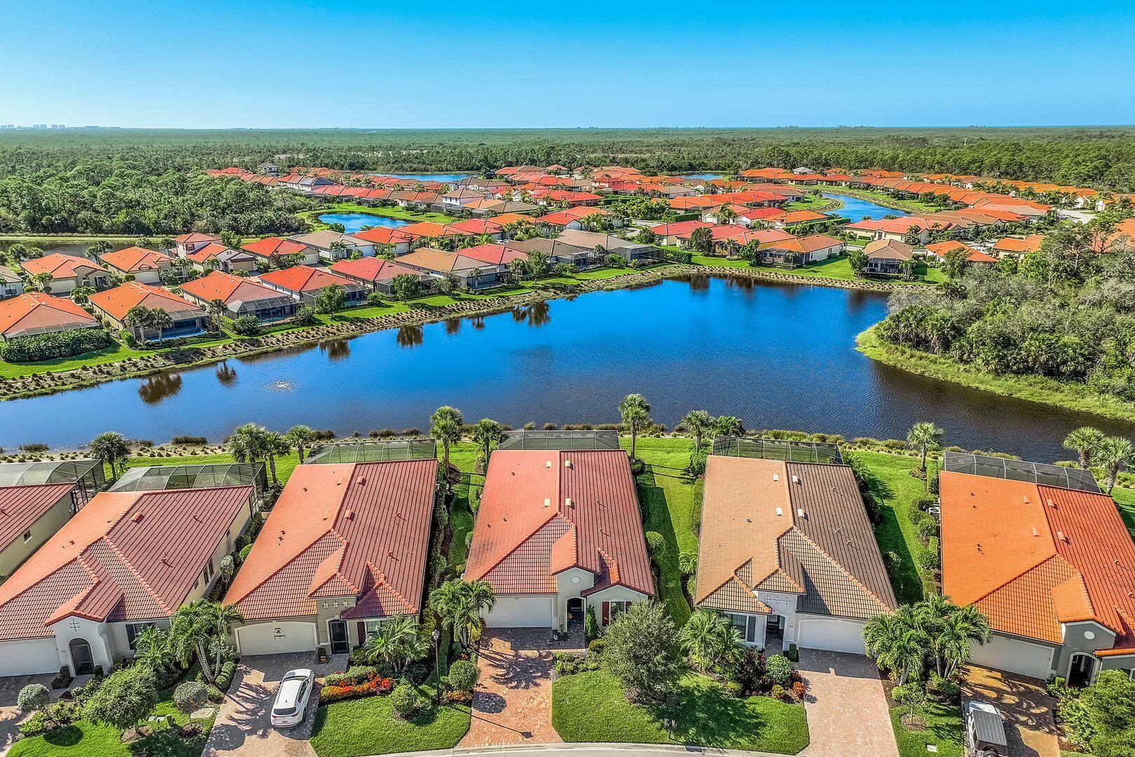 1433 Redona Way Naples, FL 34113 - Photo 37 of 50 an aerial view of residential houses with outdoor space