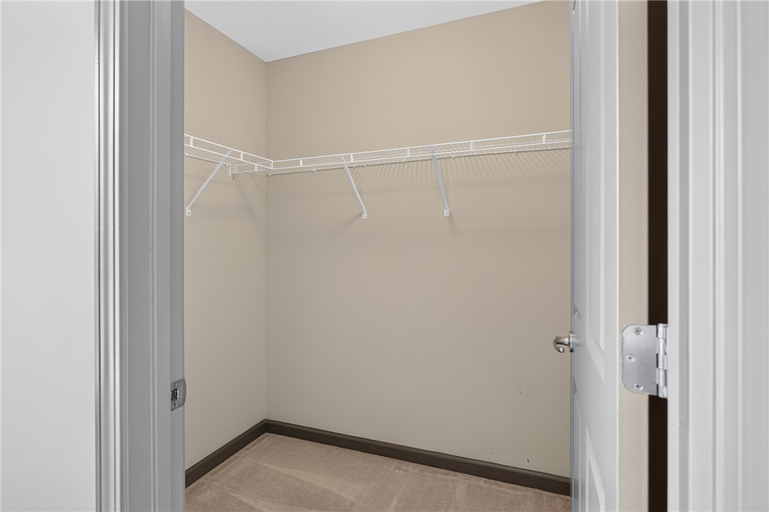 235 Pendleton Road, Unit K1 Clemson, SC 29631 - Photo 31 of 49 Maximizing storage, this closet features practical wire shelving on two walls, optimizing vertical space.