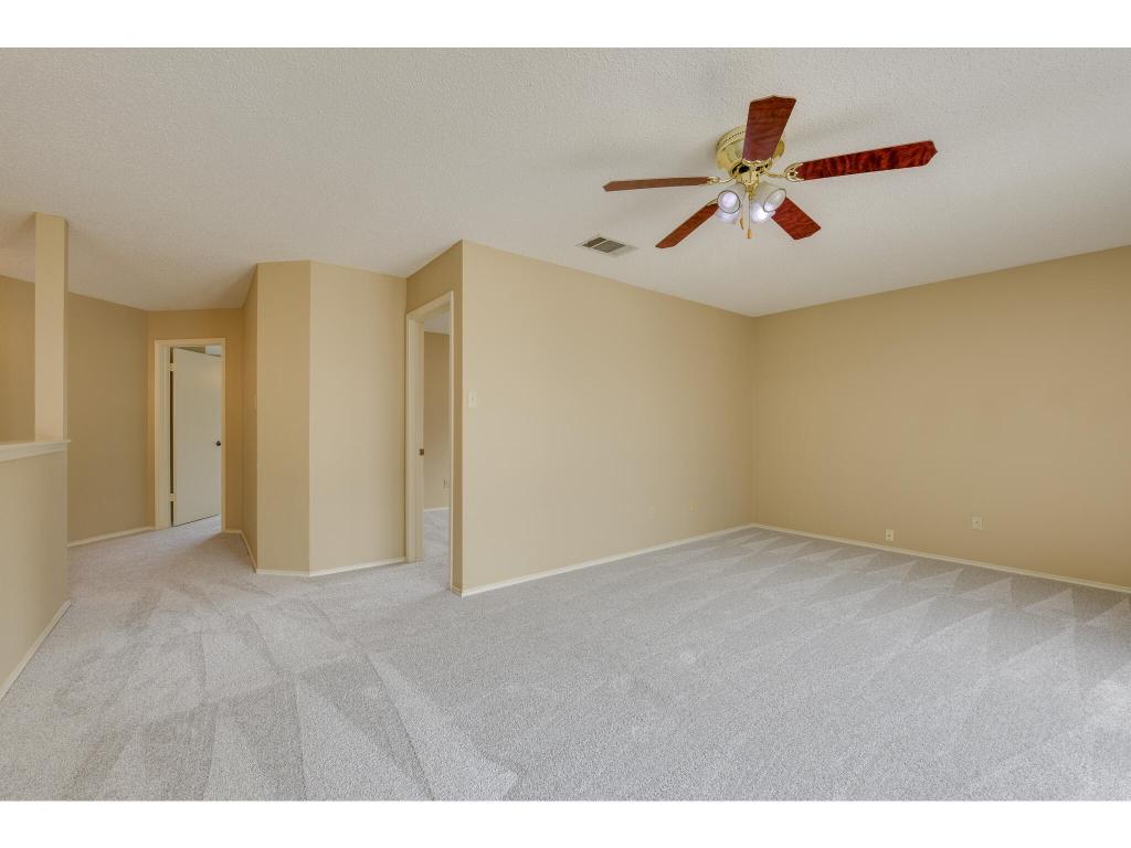 3912 Lemos Drive Austin, TX 78728 - Photo 23 of 40 a view of a livingroom with a ceiling fan and window