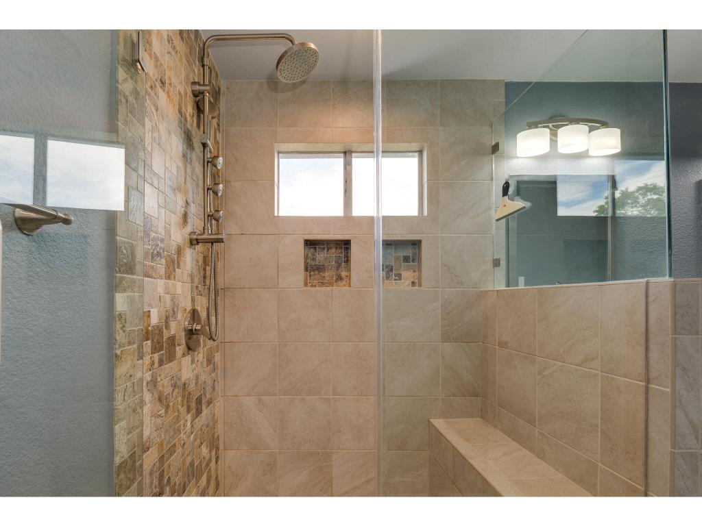 3912 Lemos Drive Austin, TX 78728 - Photo 30 of 40 a bathroom with a mirror