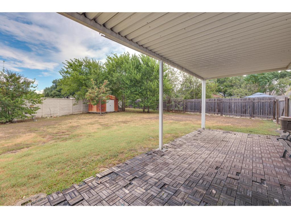 3912 Lemos Drive Austin, TX 78728 - Photo 35 of 40 a view of a backyard with a garden