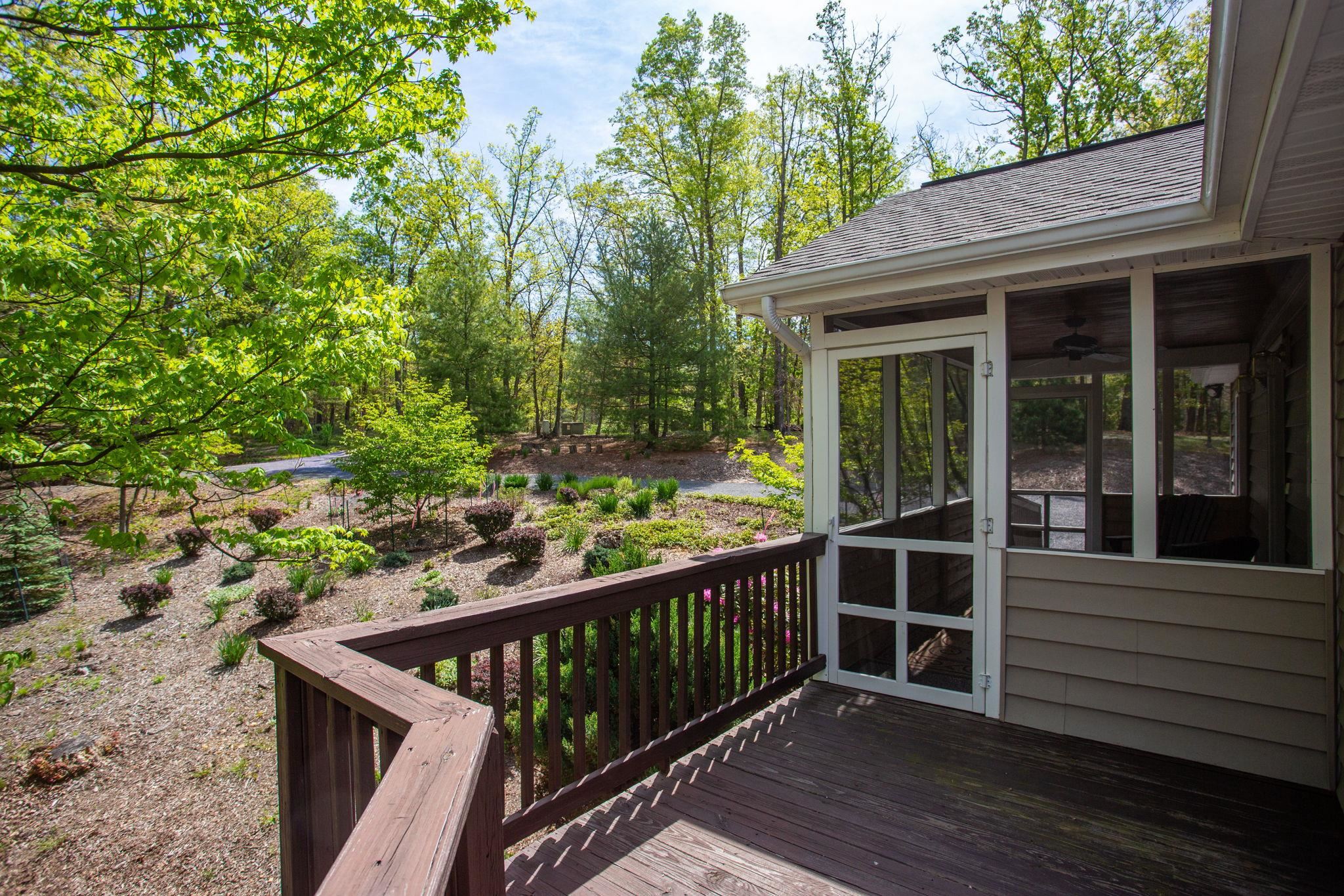 324 Mountaintop Drive Mathias, WV 26812 - Photo 24 of 27 Screened Porch Entrance