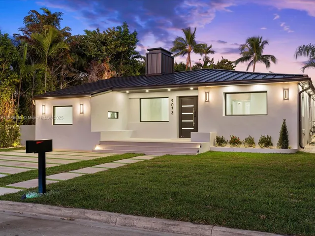 a view of an empty room with a washer and dryer
