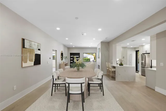 a view of a car parked in front of a house