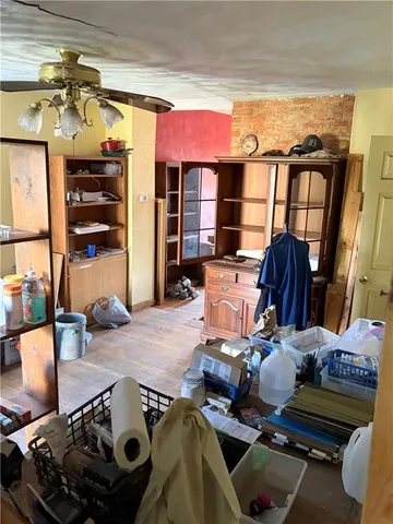 a room with furniture and gym equipment