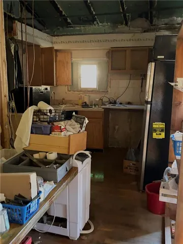 a room with wooden furniture and gym equipment