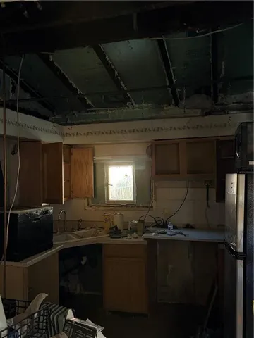 a room with wooden cabinets