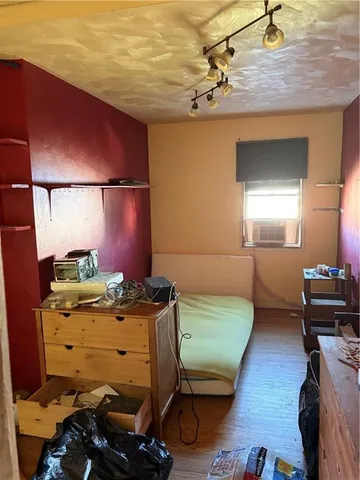 a room with furniture and a lamp