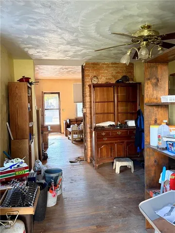 a view of an empty room with stairs