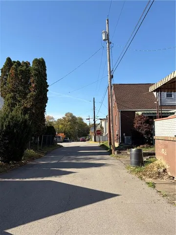 a view of a street with houses