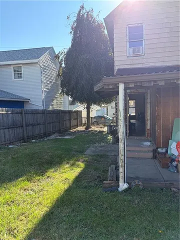 a view of an ocean & house