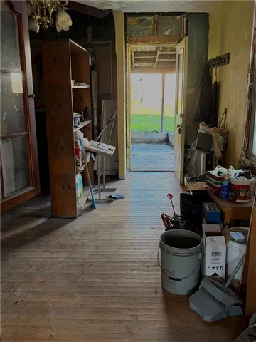 a room with table and chairs