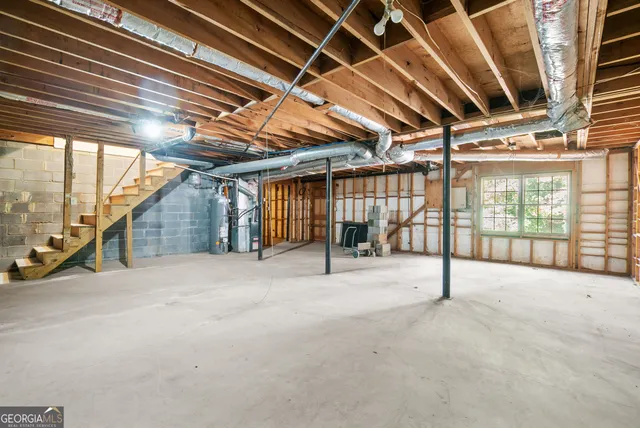 a view of an empty room with windows