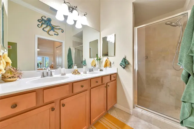 a bedroom with double bed and a window